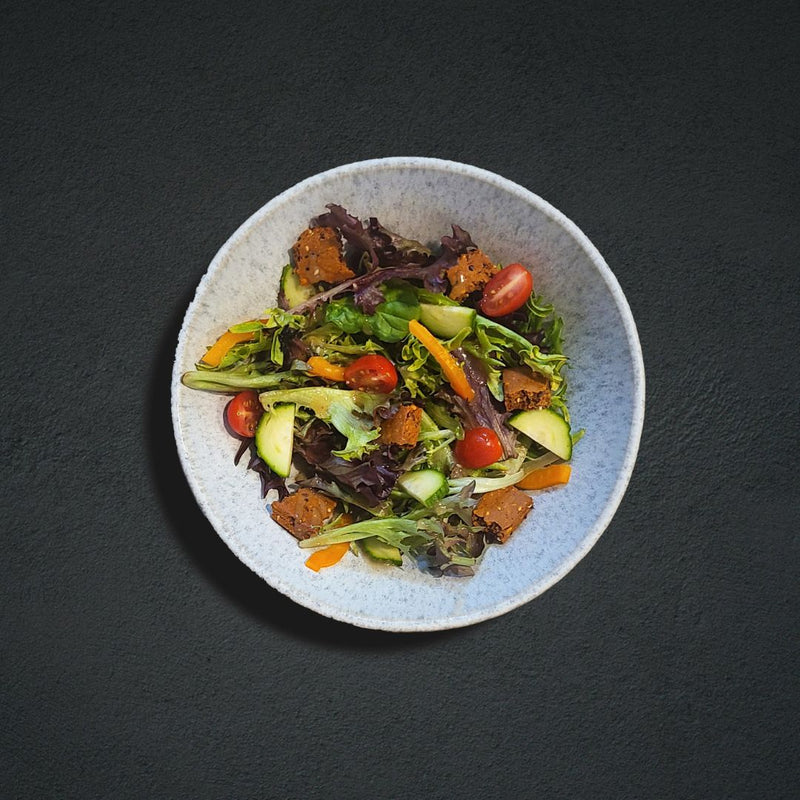 Fresh Salad Topped with Fello Protein Bars