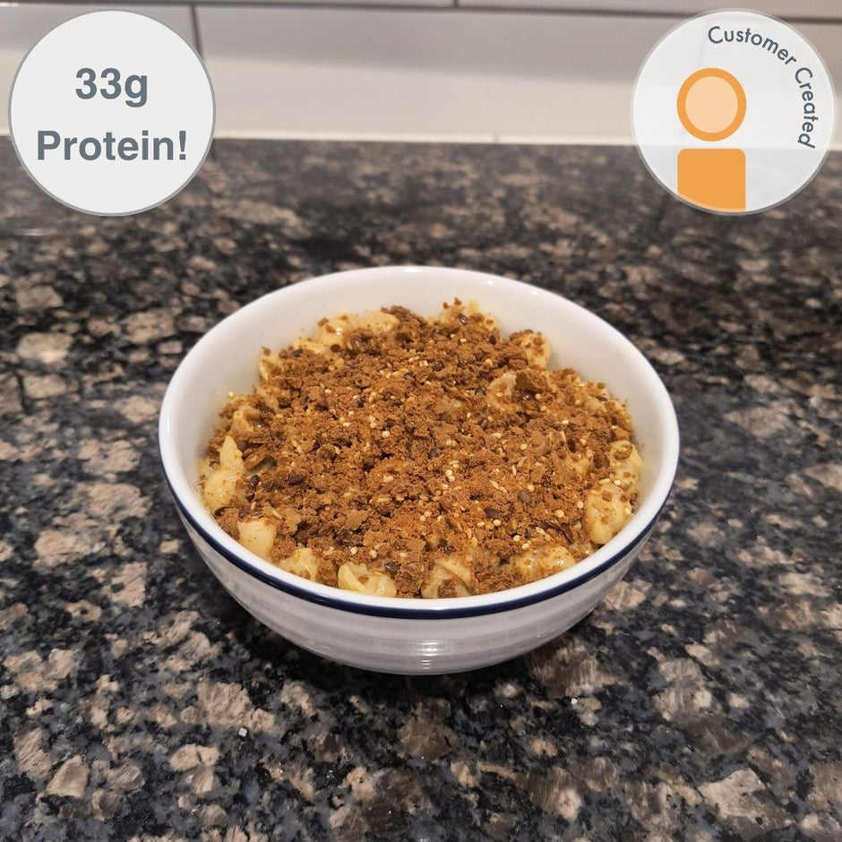 Mac and Cheese topped with Fello Everything Bagel protein bar. Fan recipe with 33g of protein per serving.