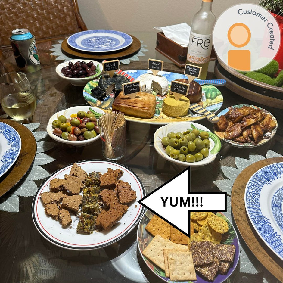 Fello Protein Bars served as crackers with vegan cheese and charcuterie.  Potluck with food and drinks.