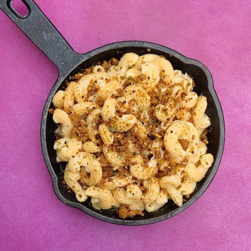 Zesty BBQ Protein Bar Crumbled On Top of Macaroni and Cheese.