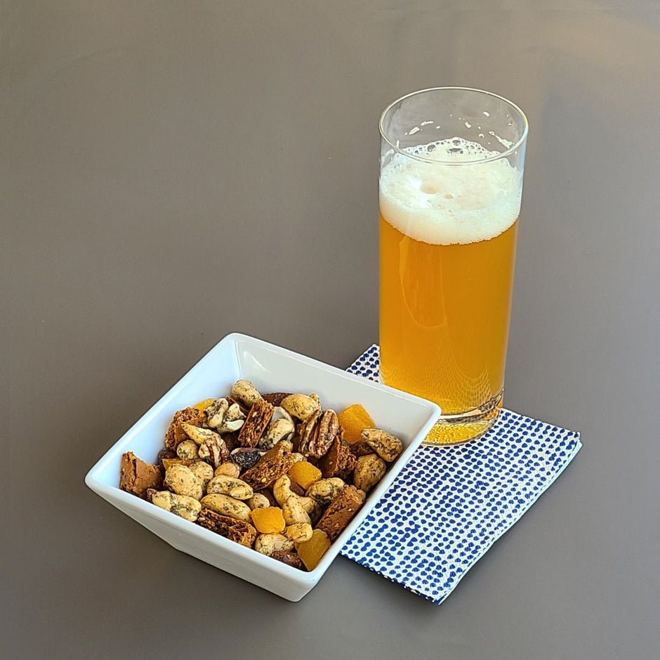 Spicy Pizza Protein Bar In Snack Mix Served With a Beer