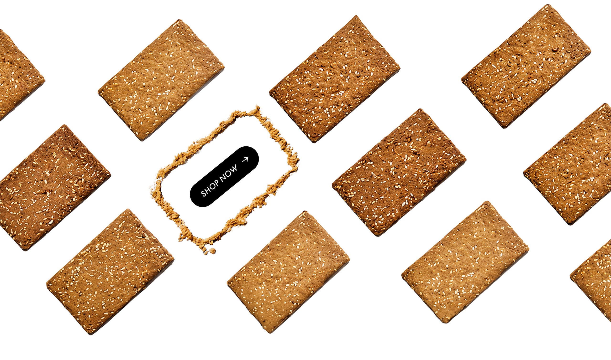 Shop now. Diagonal pattern of crispy, seeded savory protein bars flat-laid on a white background.